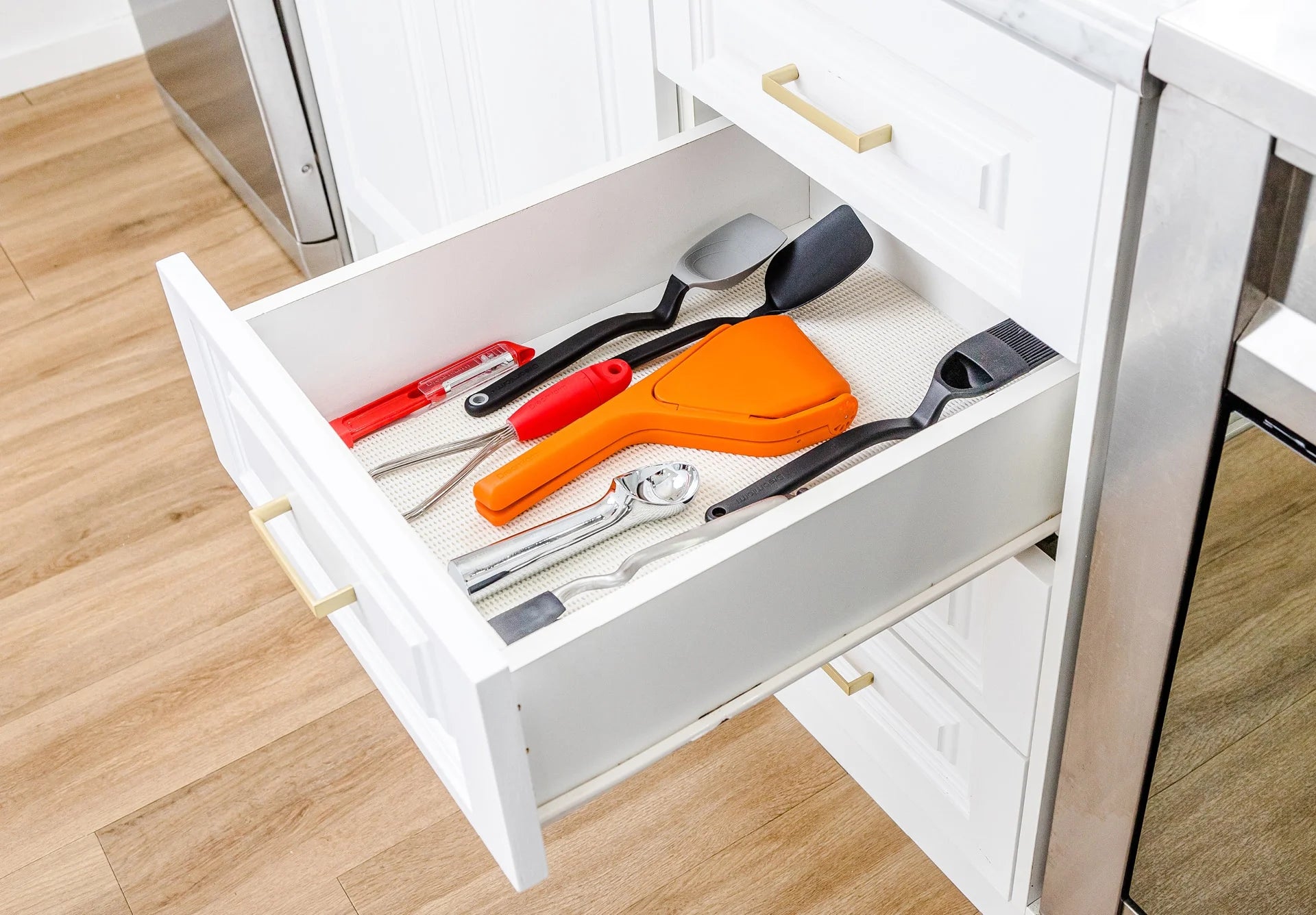 Dreamfarm_Fluicer_Web_Lifestyles_Orange_3.webp